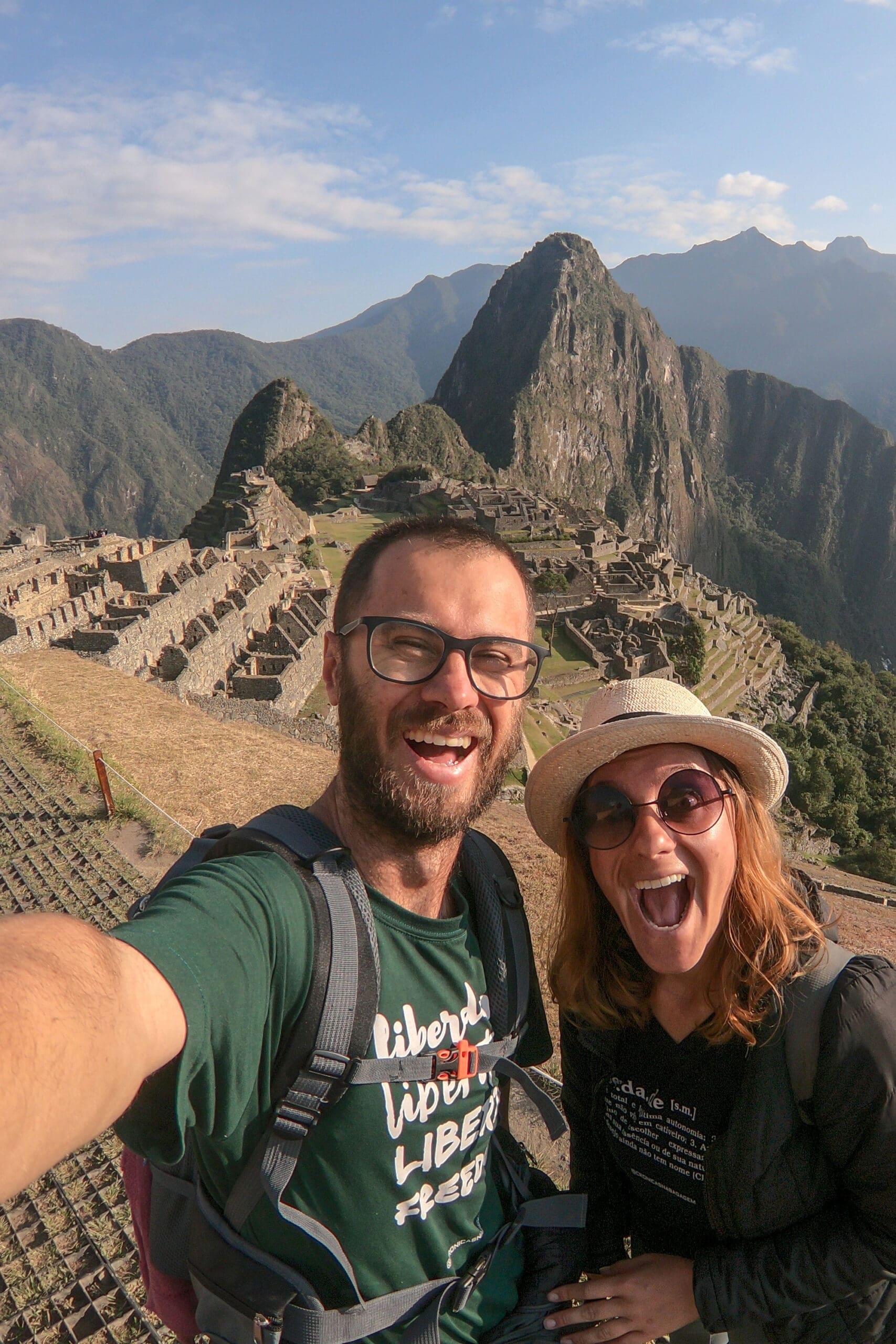 Couple taking a selfie in front of Machu Piccu